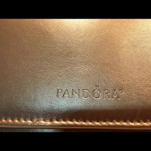 Pandora limited edition.gold hand Clutch purse. Does have some signs of wear